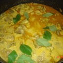 NATU KODI KURA~COUNTRY CHICKEN CURRY<br /><br />Country chicken cooked in a very spicy way is an all time favorite of rayalaseema non-vegetarian  people.<br />though this is not  as spicy as usually made, it tastes the same.I have been to my mom's place recently and she cooked this for me!!. hope you all like it.<br /><br />Ingredients:<br /> 1kg country chicken cut into small pieces<br /> 2 large onion sliced<br /> 1/2 tsp turmeric powder<br /> Salt to taste<br /> 2-3 tsp chilli powder<br /> 2 tsp corriander powder<br /> 10-12 curry leaves<br /> 2 cardamom pods(elaichi)<br /> 3cinnamon sticks(dalchinichakka)<br /> 7-8 pepper corns<br /> 5-6 tsp of oil<br /> 100 gms fresh coconut<br /> 10 gms poppy seeds(gasalu)<br /> 20 gms ginger<br /> 1 small garlic<br /> corriander for garnish<br /><br />Process:<br />1.wash the chicken pieces and keep aside.<br /> 2.Grind coconut,poppy seeds,ginger,garlic and one onion into a smooth paste.<br /> 3.Now take a pan and heat oil and add chopped onions to it.<br />4.When the onions are fried add the chicken pieces to it.<br />5. Now add turmeric powder and salt to it.<br /> 6.After frying for 5 minutes add the grinded paste to it.<br />7.Stir it well. and fry for another five minutes.<br />8.Add chilli powder to it.<br />9.After mixing well add corriander powder to it.<br />10. It takes more amount of water and time for the country chicken to cook than the ordinary ones.<br /> so pour about 3 glasses of water to it.<br />11.Add the curry leaves to it.<br />12. Now close the lid and cook for about16-17 minutes.<br /> 13.Now add the grinded spices(elaichi,cardamom,cinnamon,pepper corns and poppy seeds).<br />14. Lastly add corriander and serve hot with rice or sangati or chapathi.