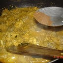 NATU KODI KURA~COUNTRY CHICKEN CURRY<br /><br />Country chicken cooked in a very spicy way is an all time favorite of rayalaseema non-vegetarian  people.<br />though this is not  as spicy as usually made, it tastes the same.I have been to my mom's place recently and she cooked this for me!!. hope you all like it.<br /><br />Ingredients:<br /> 1kg country chicken cut into small pieces<br /> 2 large onion sliced<br /> 1/2 tsp turmeric powder<br /> Salt to taste<br /> 2-3 tsp chilli powder<br /> 2 tsp corriander powder<br /> 10-12 curry leaves<br /> 2 cardamom pods(elaichi)<br /> 3cinnamon sticks(dalchinichakka)<br /> 7-8 pepper corns<br /> 5-6 tsp of oil<br /> 100 gms fresh coconut<br /> 10 gms poppy seeds(gasalu)<br /> 20 gms ginger<br /> 1 small garlic<br /> corriander for garnish<br /><br />Process:<br />1.wash the chicken pieces and keep aside.<br /> 2.Grind coconut,poppy seeds,ginger,garlic and one onion into a smooth paste.<br /> 3.Now take a pan and heat oil and add chopped onions to it.<br />4.When the onions are fried add the chicken pieces to it.<br />5. Now add turmeric powder and salt to it.<br /> 6.After frying for 5 minutes add the grinded paste to it.<br />7.Stir it well. and fry for another five minutes.<br />8.Add chilli powder to it.<br />9.After mixing well add corriander powder to it.<br />10. It takes more amount of water and time for the country chicken to cook than the ordinary ones.<br /> so pour about 3 glasses of water to it.<br />11.Add the curry leaves to it.<br />12. Now close the lid and cook for about16-17 minutes.<br /> 13.Now add the grinded spices(elaichi,cardamom,cinnamon,pepper corns and poppy seeds).<br />14. Lastly add corriander and serve hot with rice or sangati or chapathi.