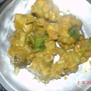 NATU KODI KURA~COUNTRY CHICKEN CURRY<br /><br />Country chicken cooked in a very spicy way is an all time favorite of rayalaseema non-vegetarian  people.<br />though this is not  as spicy as usually made, it tastes the same.I have been to my mom's place recently and she cooked this for me!!. hope you all like it.<br /><br />Ingredients:<br /> 1kg country chicken cut into small pieces<br /> 2 large onion sliced<br /> 1/2 tsp turmeric powder<br /> Salt to taste<br /> 2-3 tsp chilli powder<br /> 2 tsp corriander powder<br /> 10-12 curry leaves<br /> 2 cardamom pods(elaichi)<br /> 3cinnamon sticks(dalchinichakka)<br /> 7-8 pepper corns<br /> 5-6 tsp of oil<br /> 100 gms fresh coconut<br /> 10 gms poppy seeds(gasalu)<br /> 20 gms ginger<br /> 1 small garlic<br /> corriander for garnish<br /><br />Process:<br />1.wash the chicken pieces and keep aside.<br /> 2.Grind coconut,poppy seeds,ginger,garlic and one onion into a smooth paste.<br /> 3.Now take a pan and heat oil and add chopped onions to it.<br />4.When the onions are fried add the chicken pieces to it.<br />5. Now add turmeric powder and salt to it.<br /> 6.After frying for 5 minutes add the grinded paste to it.<br />7.Stir it well. and fry for another five minutes.<br />8.Add chilli powder to it.<br />9.After mixing well add corriander powder to it.<br />10. It takes more amount of water and time for the country chicken to cook than the ordinary ones.<br /> so pour about 3 glasses of water to it.<br />11.Add the curry leaves to it.<br />12. Now close the lid and cook for about16-17 minutes.<br /> 13.Now add the grinded spices(elaichi,cardamom,cinnamon,pepper corns and poppy seeds).<br />14. Lastly add corriander and serve hot with rice or sangati or chapathi.